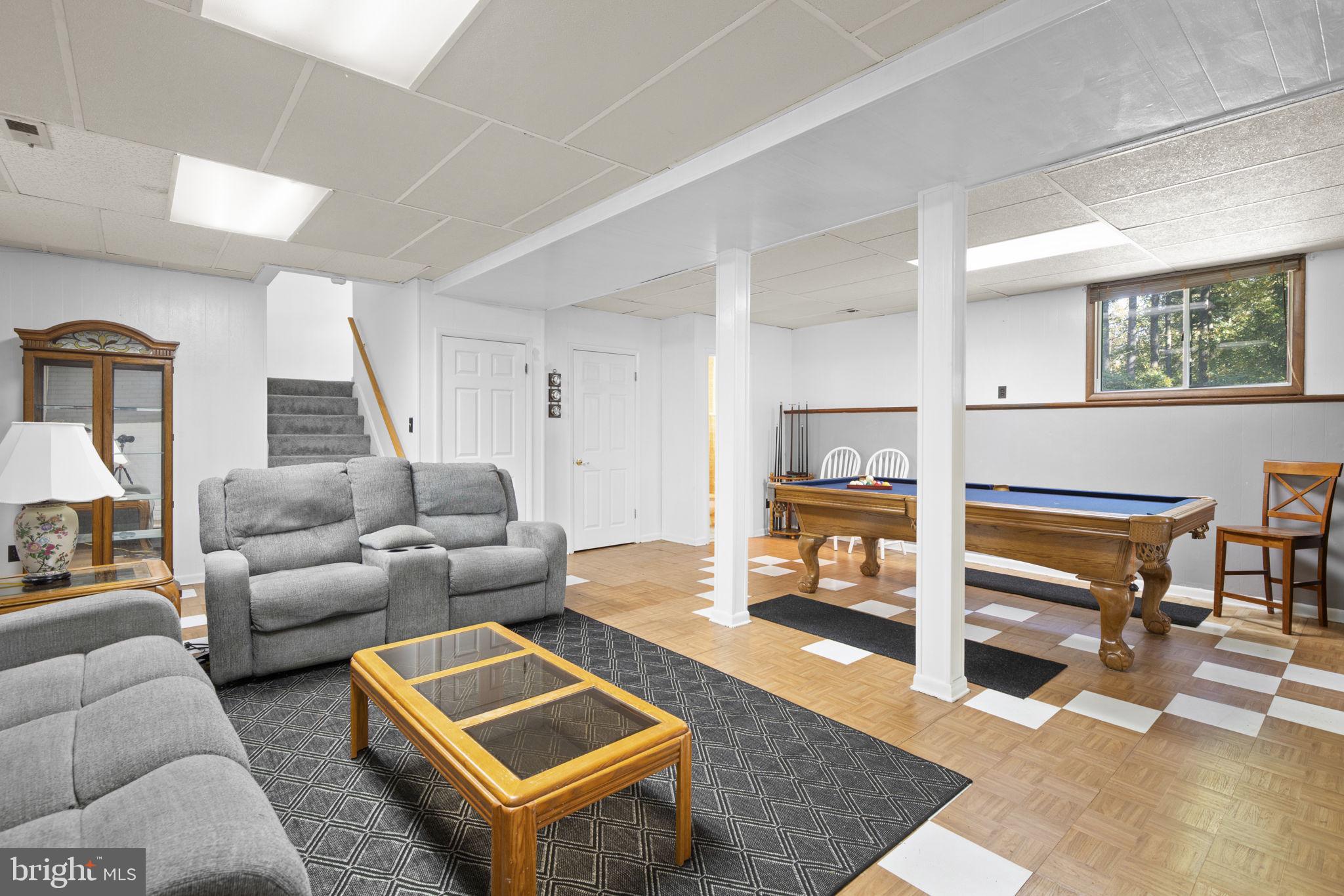 1775 Pleasantville Road Forest Hill, MD 21050 - Photo 15 of 35 a living room with furniture and a wooden floor