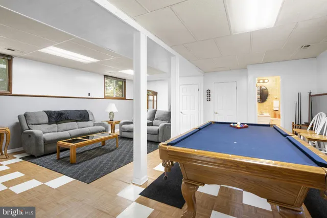 a bedroom with furniture and a couch