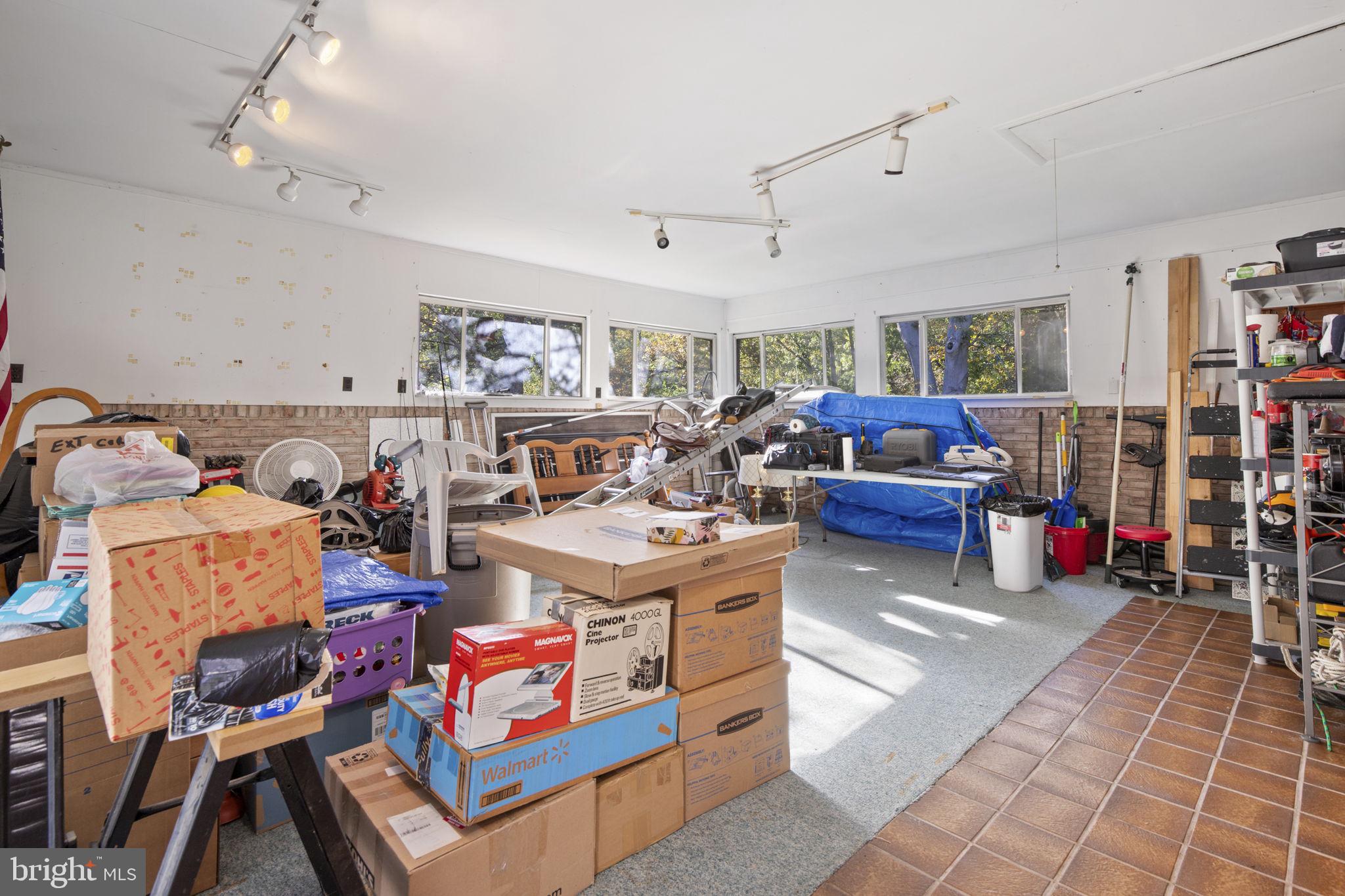 1775 Pleasantville Road Forest Hill, MD 21050 - Photo 19 of 35 a living room with furniture and a book shelf