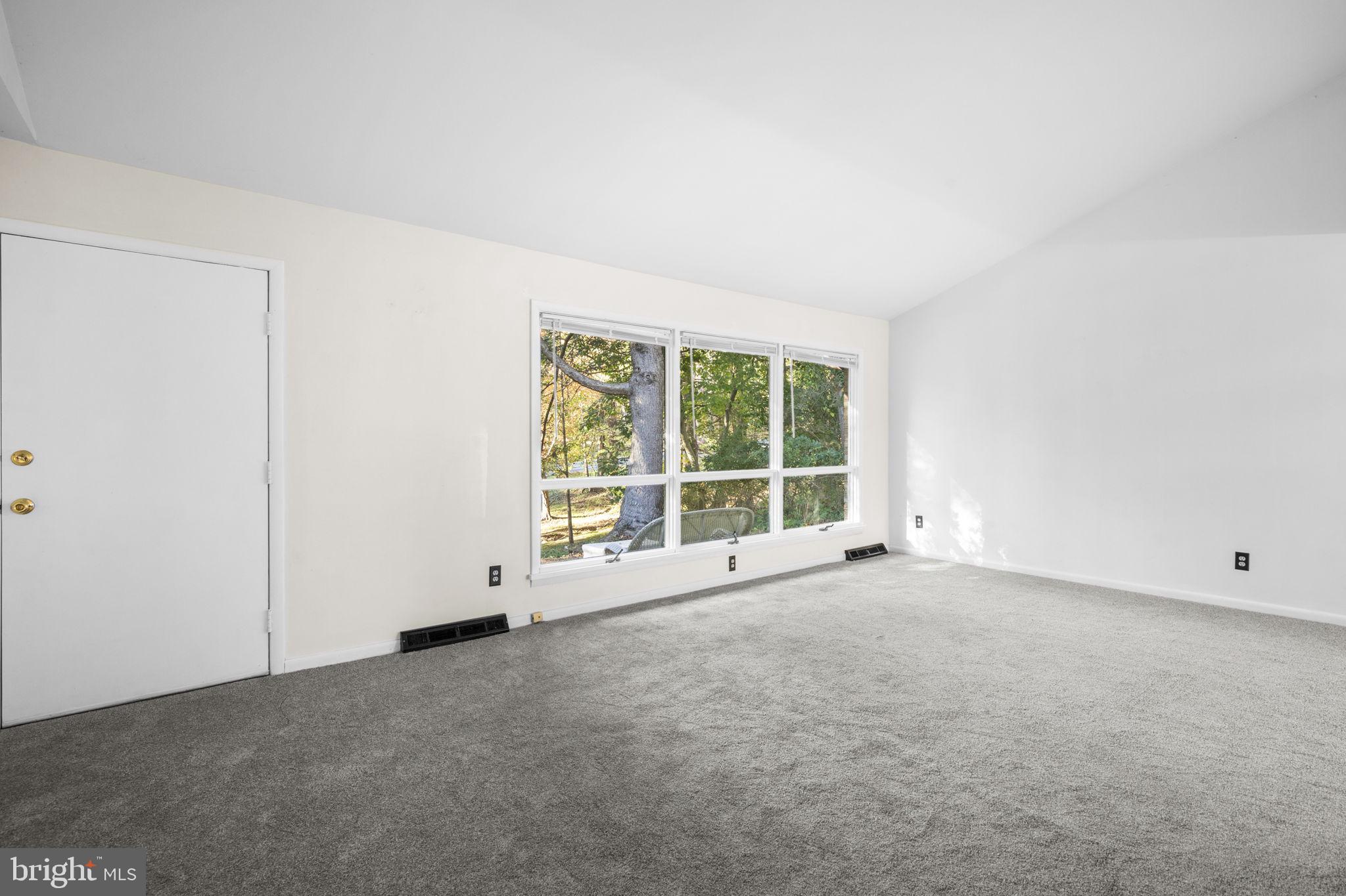 1775 Pleasantville Road Forest Hill, MD 21050 - Photo 2 of 35 an empty room with a large window