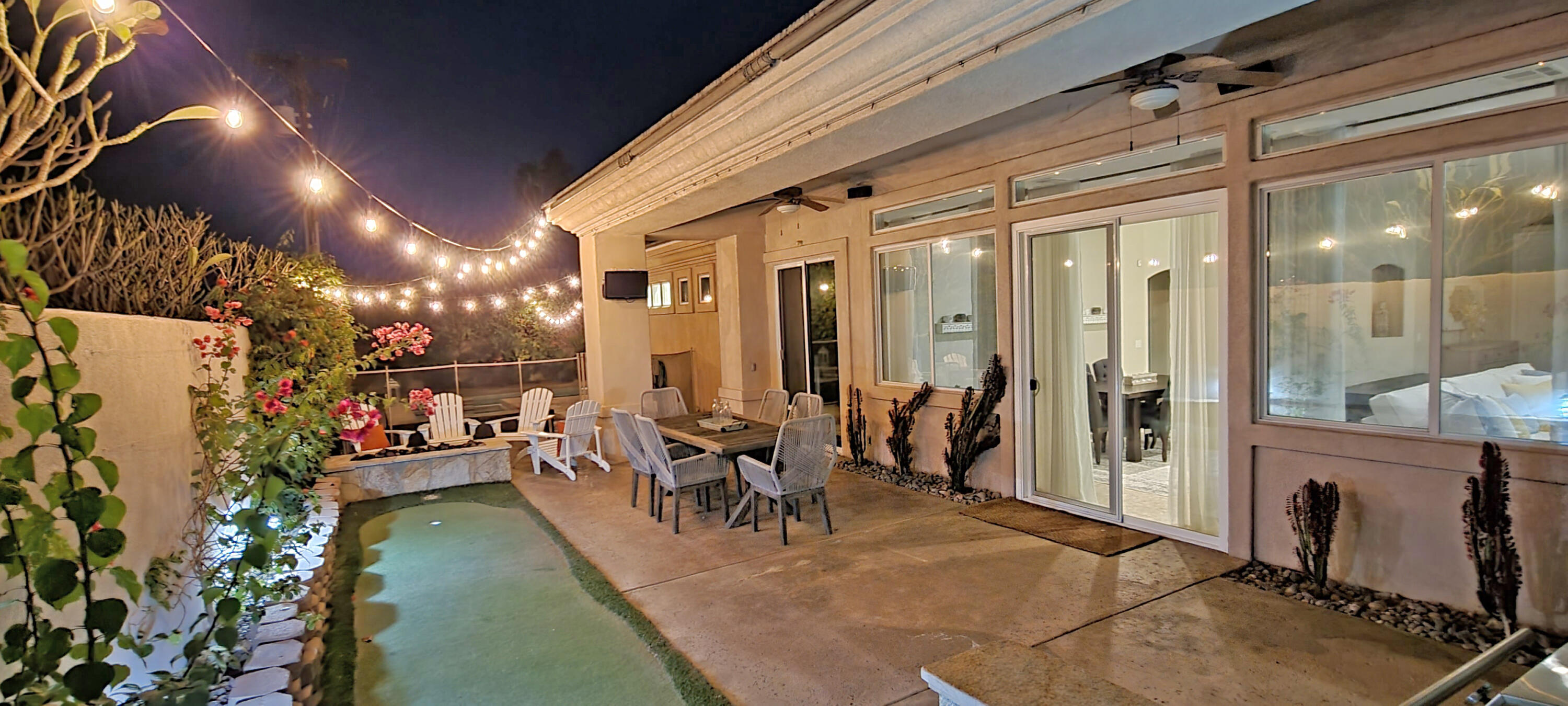42128 May Pen Road Bermuda Dunes, CA 92203 - Photo 29 of 32 a living room with lots of furniture and a refrigerator