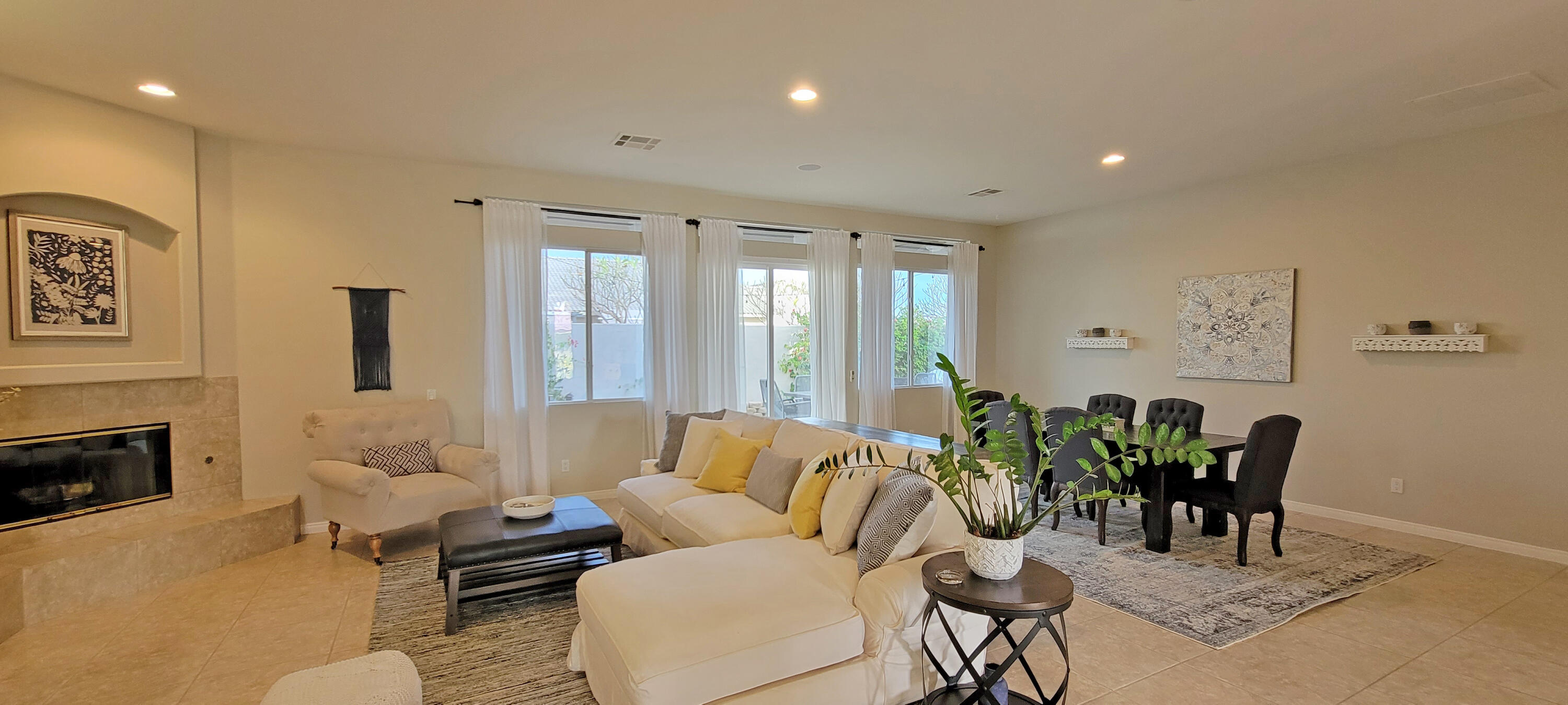 42128 May Pen Road Bermuda Dunes, CA 92203 - Photo 32 of 32 a living room with furniture and fireplace