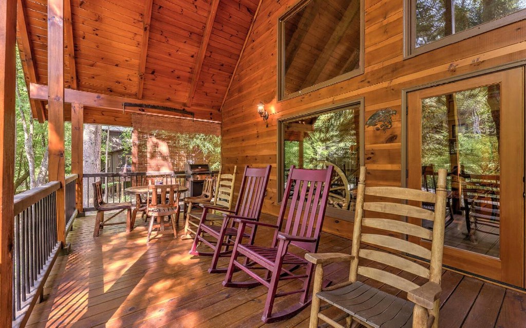 343 Muller Lane Ellijay, GA 30540 - Photo 8 of 35 a view of a chairs and table in the balcony