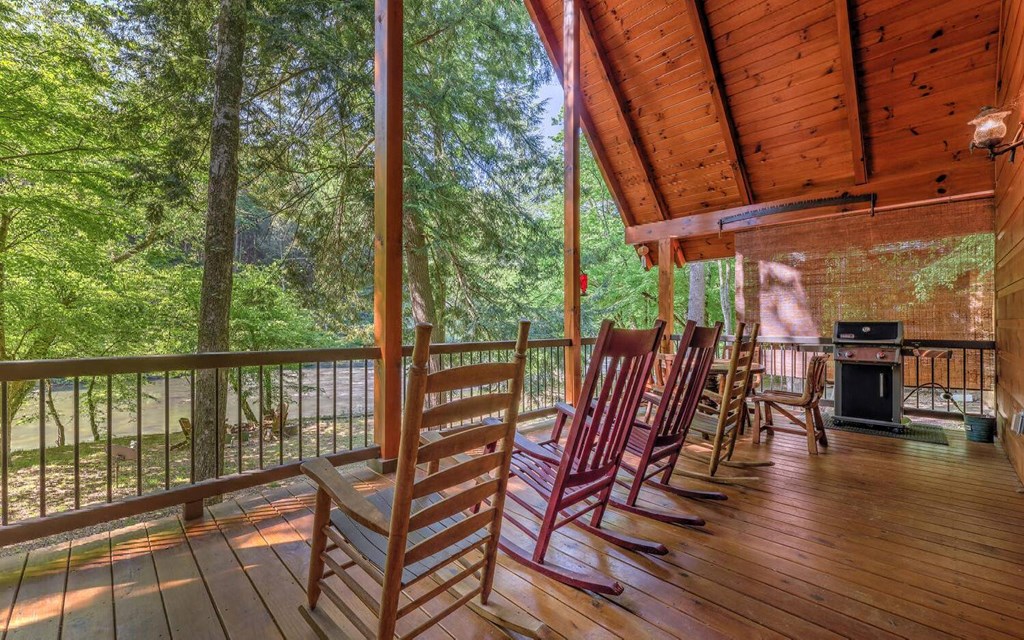 343 Muller Lane Ellijay, GA 30540 - Photo 9 of 35 a view of a chairs and table on the wooden floor