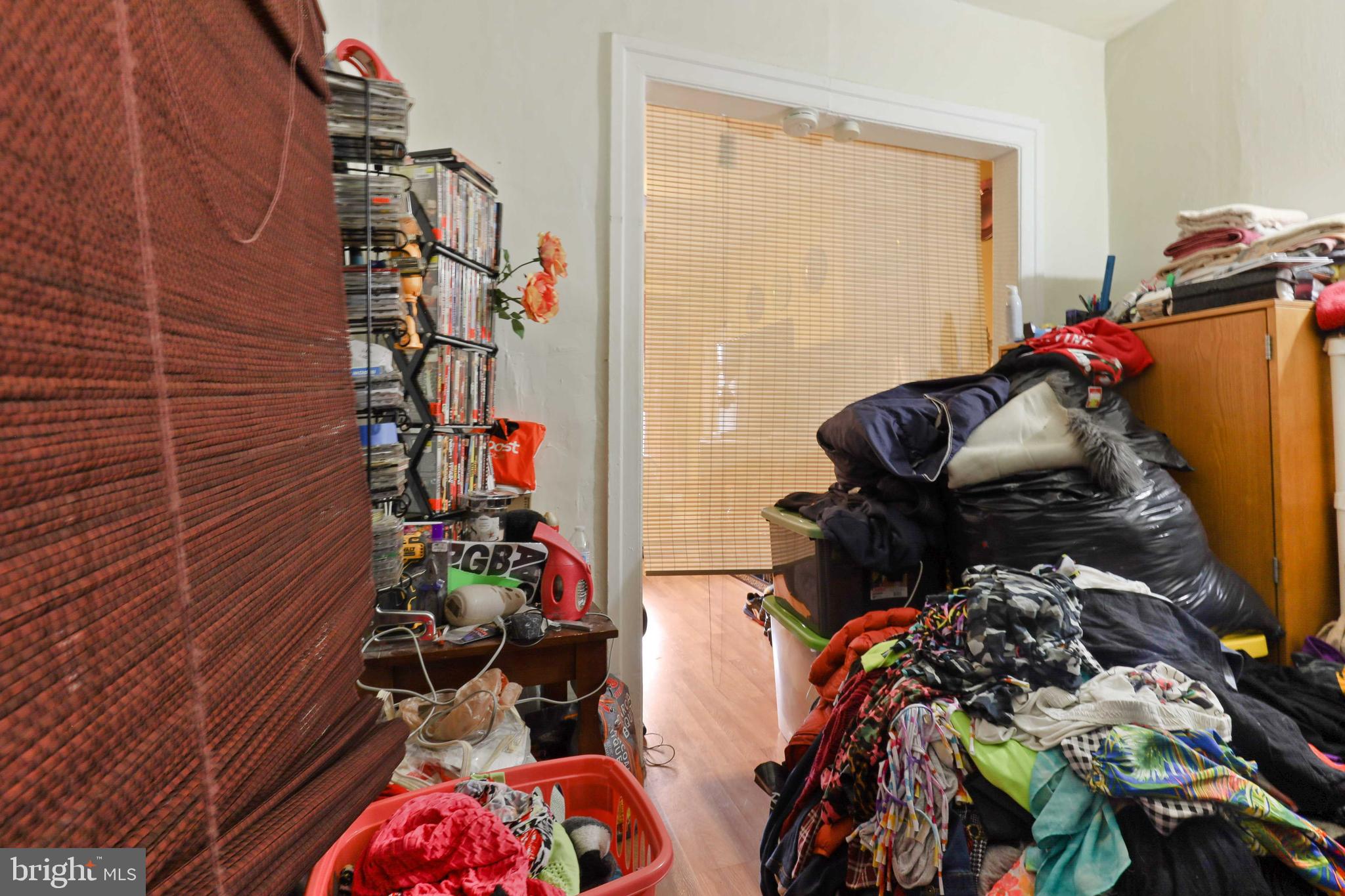 3955 Greenmount Avenue Baltimore, MD 21218 - Photo 11 of 42 Formal dining room (being used as walk in closet