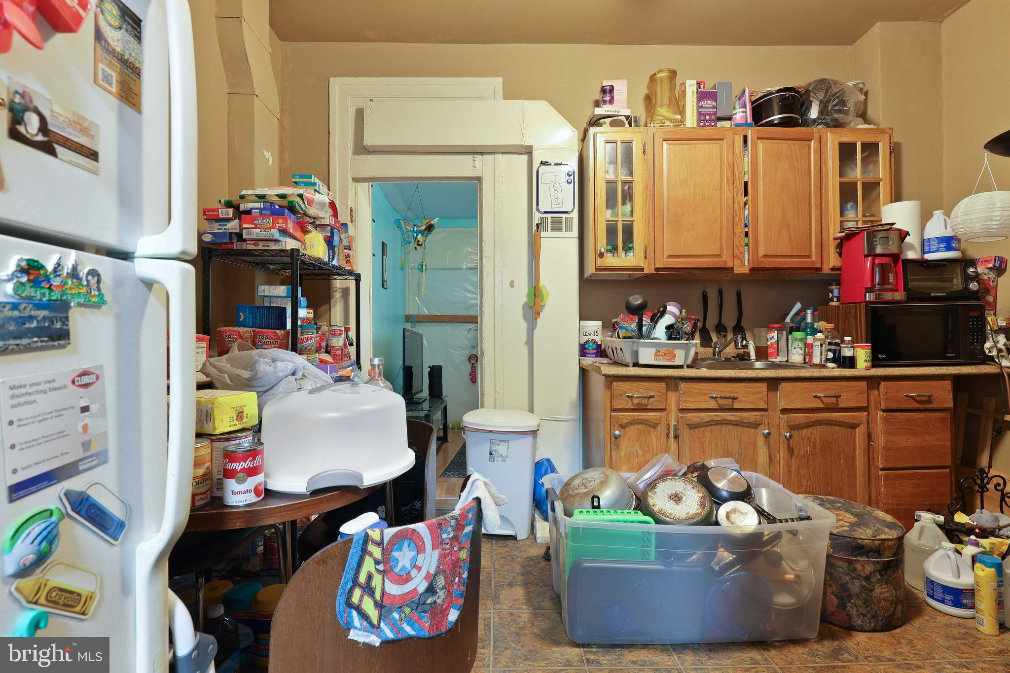 3955 Greenmount Avenue Baltimore, MD 21218 - Photo 18 of 42 Main level kitchen looking onto rear den