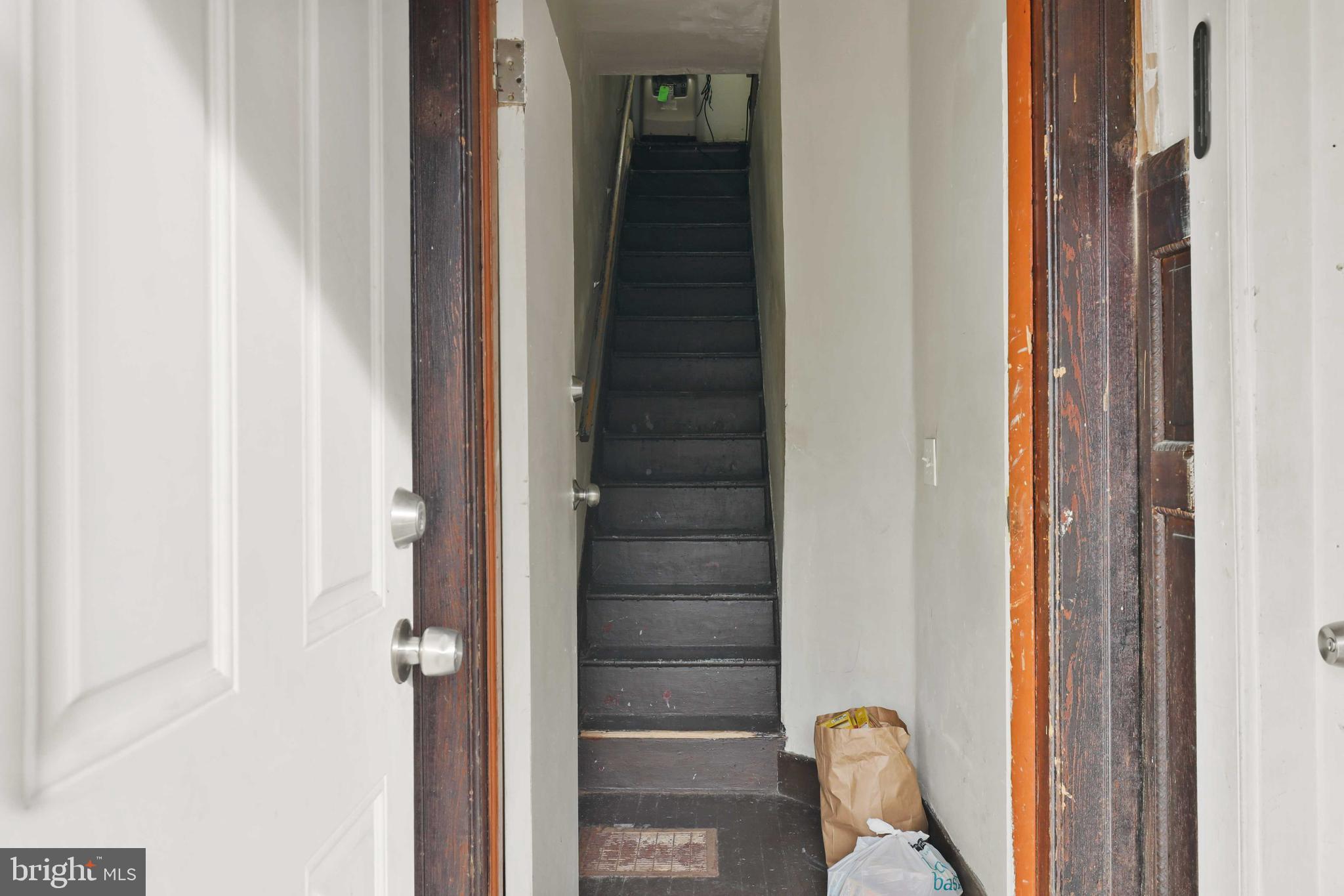 3955 Greenmount Avenue Baltimore, MD 21218 - Photo 29 of 42 Front entrance-Right to 1st floor w/stairs to 2nd