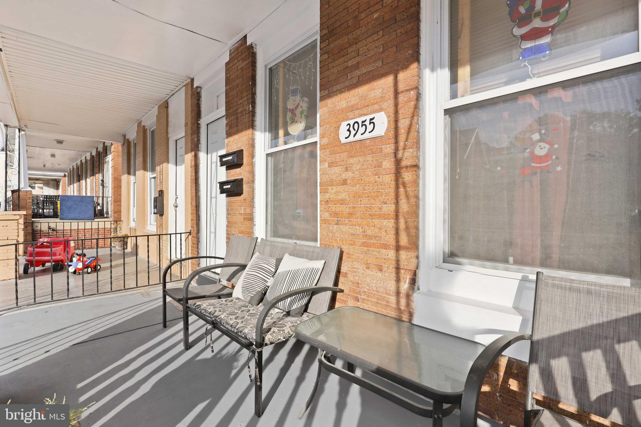 3955 Greenmount Avenue Baltimore, MD 21218 - Photo 6 of 42 Welcoming porch front home