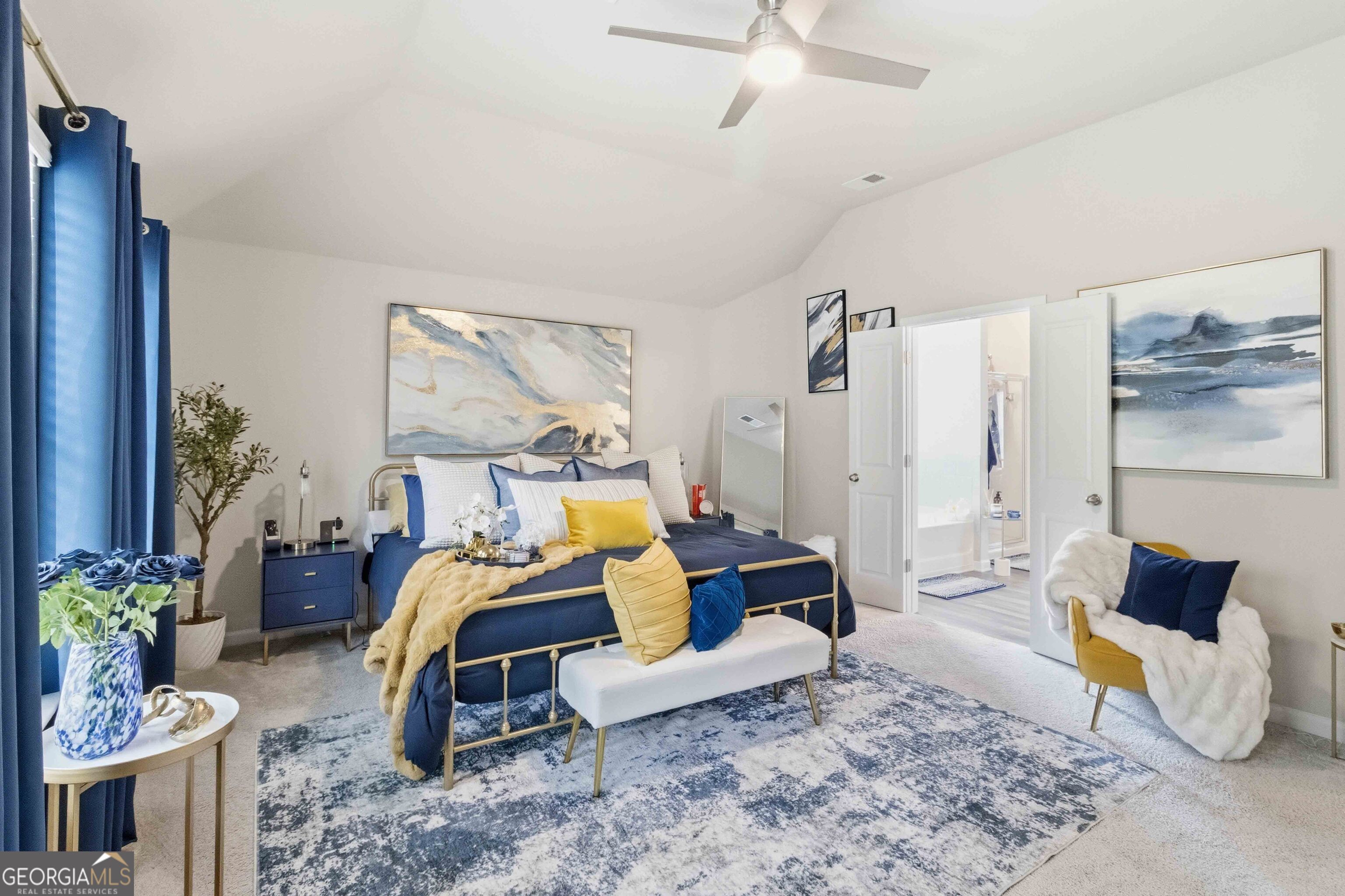 386 Paden Way Jonesboro, GA 30238 - Photo 17 of 29 a bed room with a bed and a couch