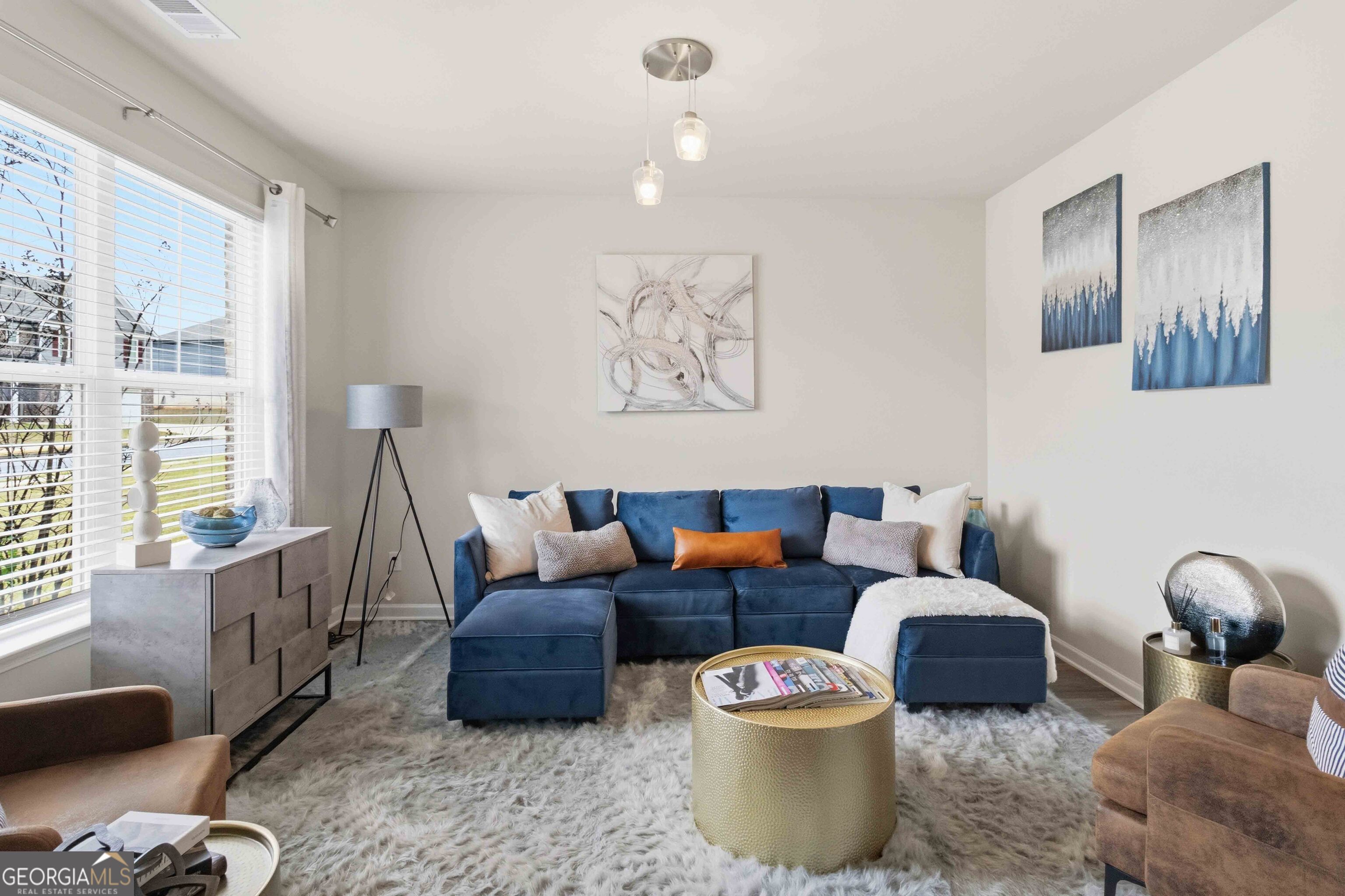 386 Paden Way Jonesboro, GA 30238 - Photo 6 of 29 a living room with furniture and a window