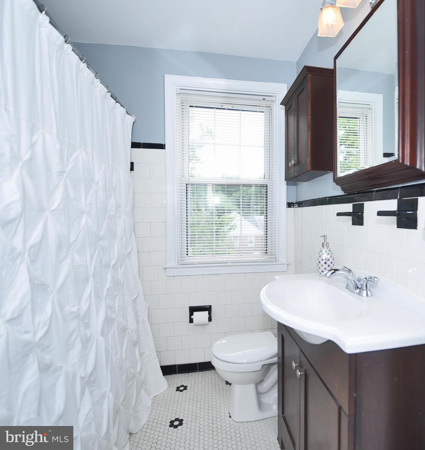 8112 Clyde Bank Road Baltimore, MD 21286 - Photo 13 of 30 Neutral Tile Bath