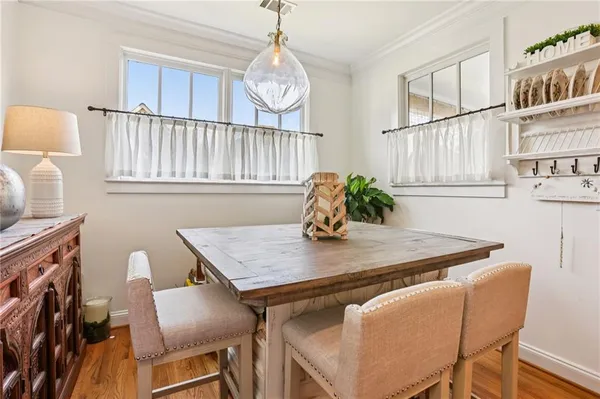 a view of a dining room with furniture