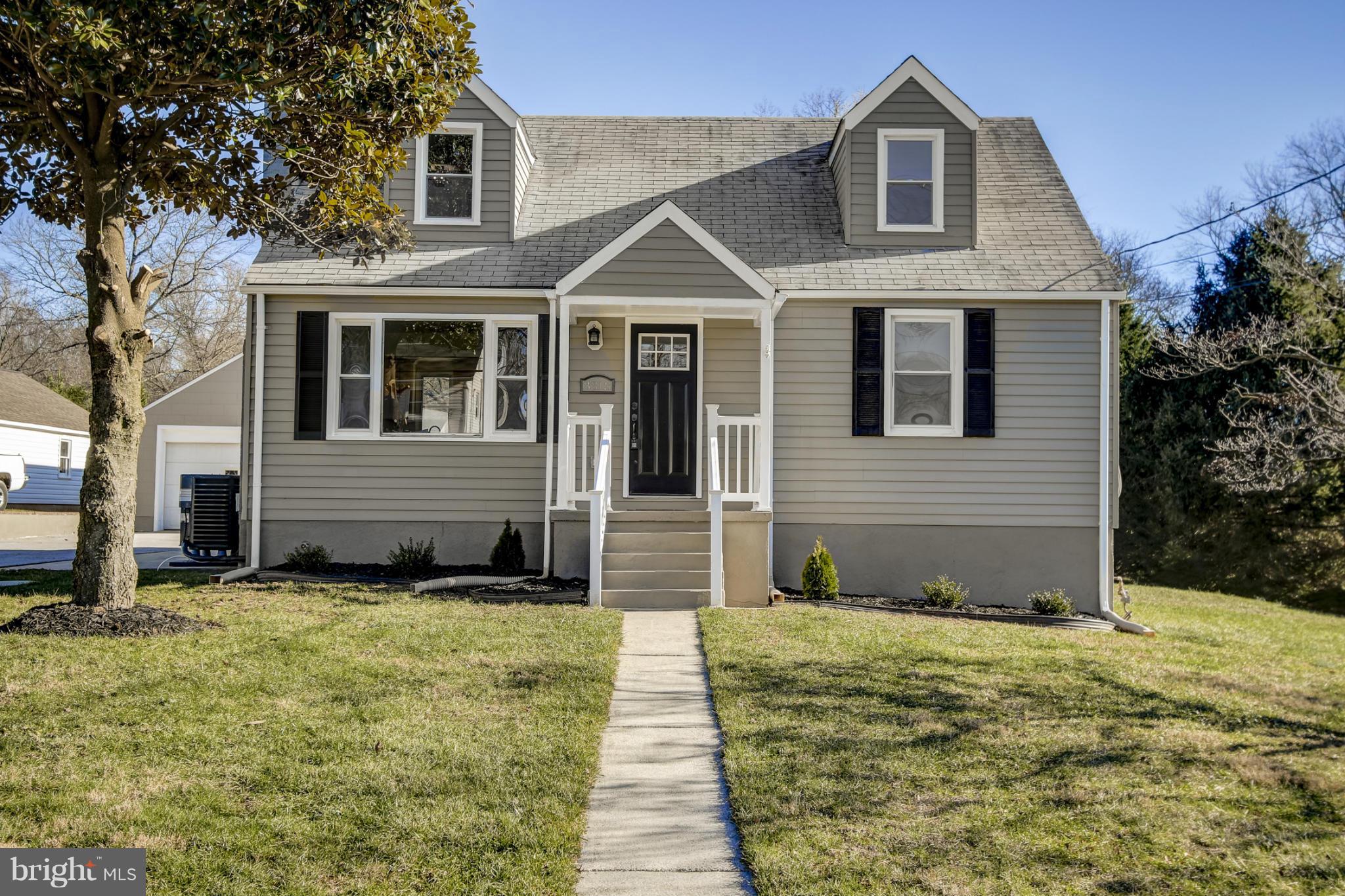 3313 Chapman Road Randallstown, MD 21133 - Photo 1 of 30 a view of a house with a yard
