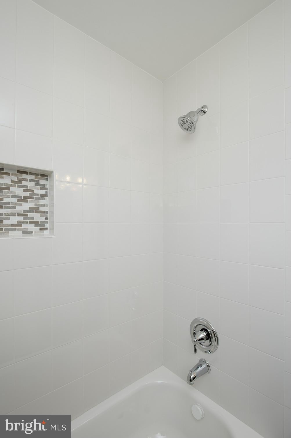 3313 Chapman Road Randallstown, MD 21133 - Photo 15 of 30 a bathroom with a bathtub