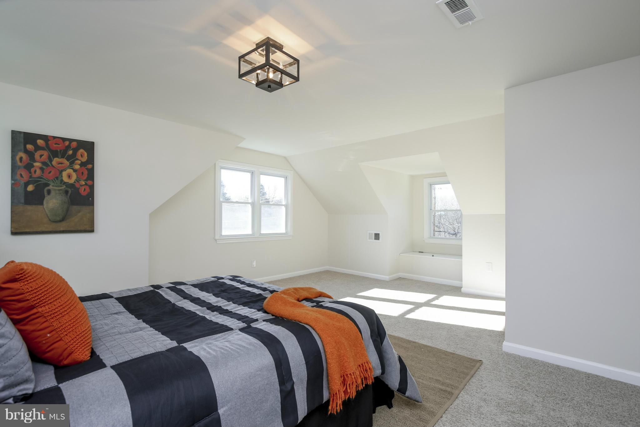 3313 Chapman Road Randallstown, MD 21133 - Photo 18 of 30 a bedroom with bed and window