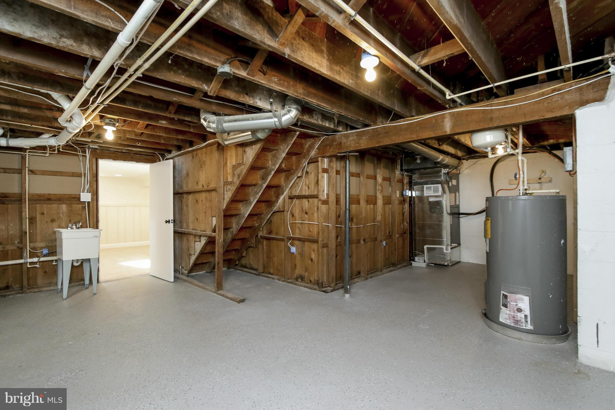 3313 Chapman Road Randallstown, MD 21133 - Photo 23 of 30 a view of water heater room with refrigerator