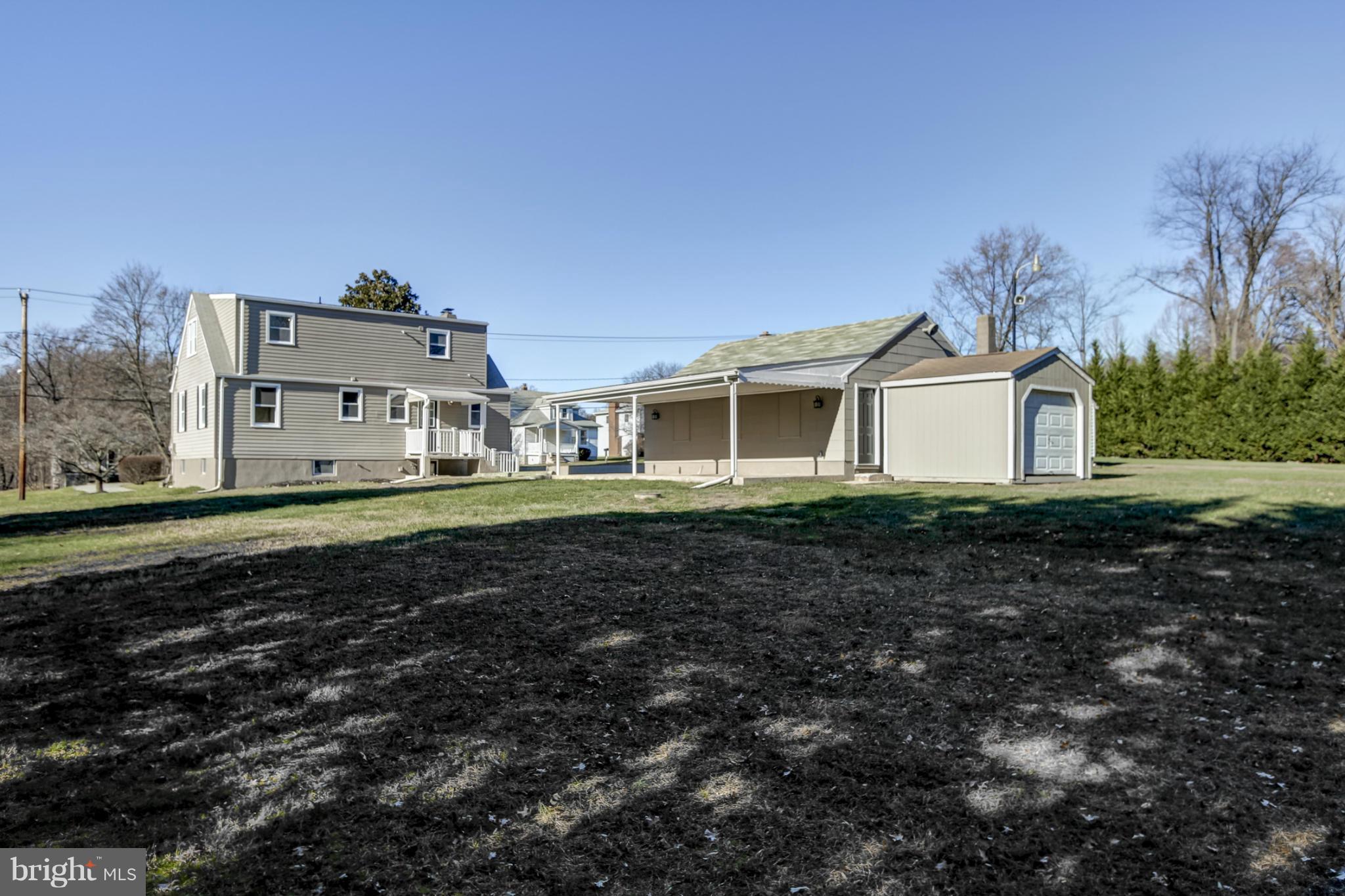 3313 Chapman Road Randallstown, MD 21133 - Photo 29 of 30 a front view of a house with a yard