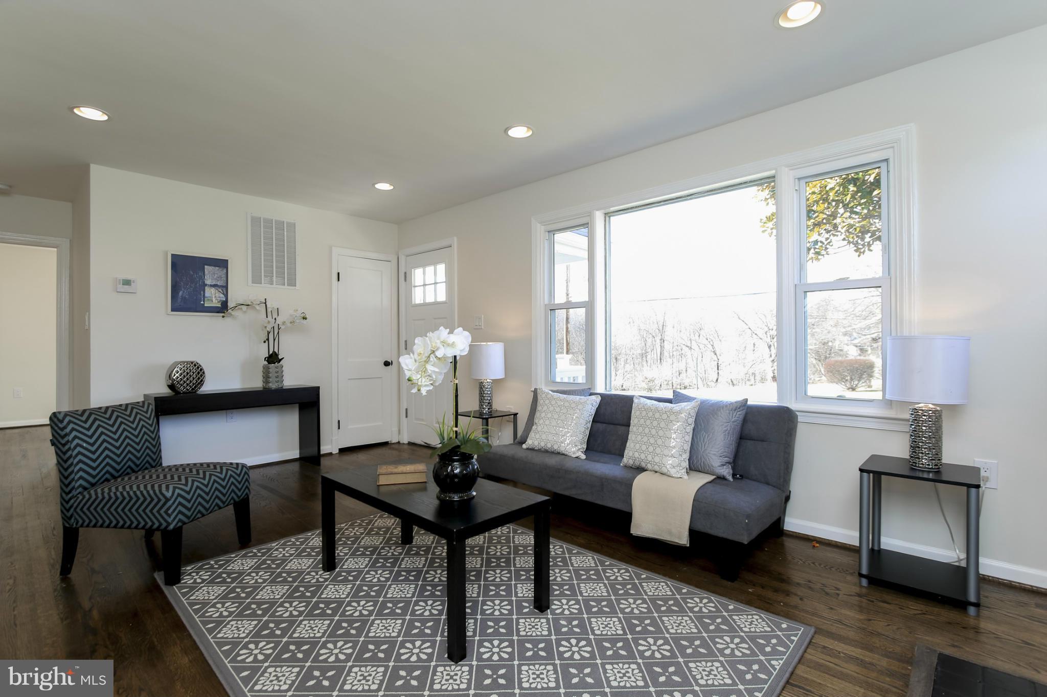 3313 Chapman Road Randallstown, MD 21133 - Photo 4 of 30 a living room with furniture and a window