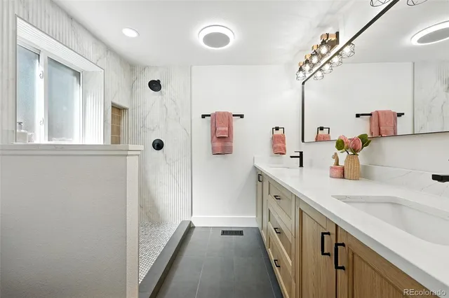 a kitchen with a sink and a refrigerator
