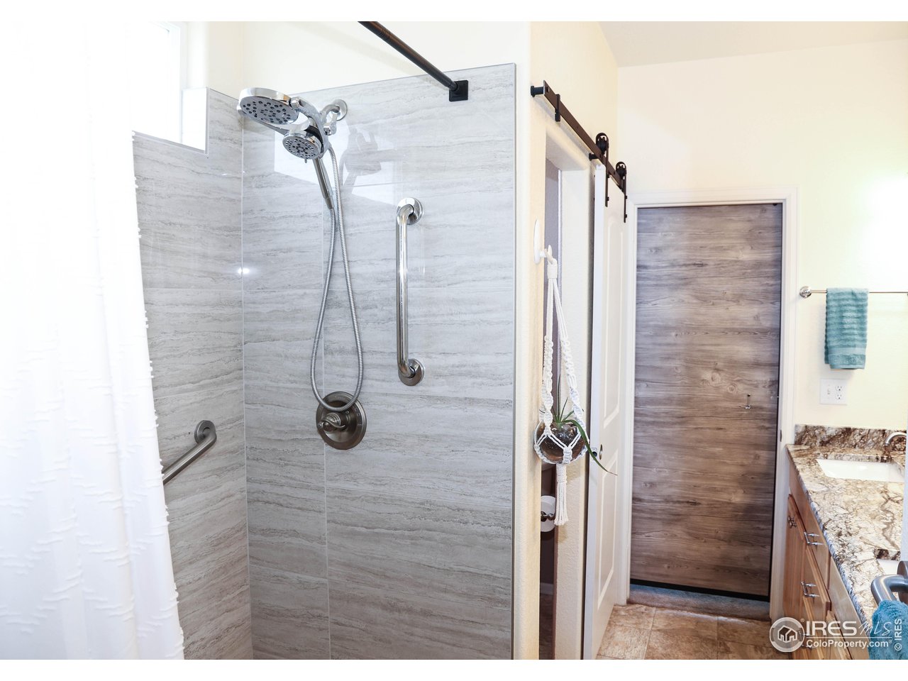 7587 McClellan Road Wellington, CO 80549 - Photo 18 of 31 Beautiful shower tile!
