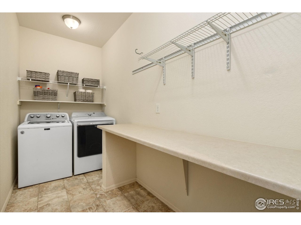 7587 McClellan Road Wellington, CO 80549 - Photo 22 of 31 Extra large Laundry room