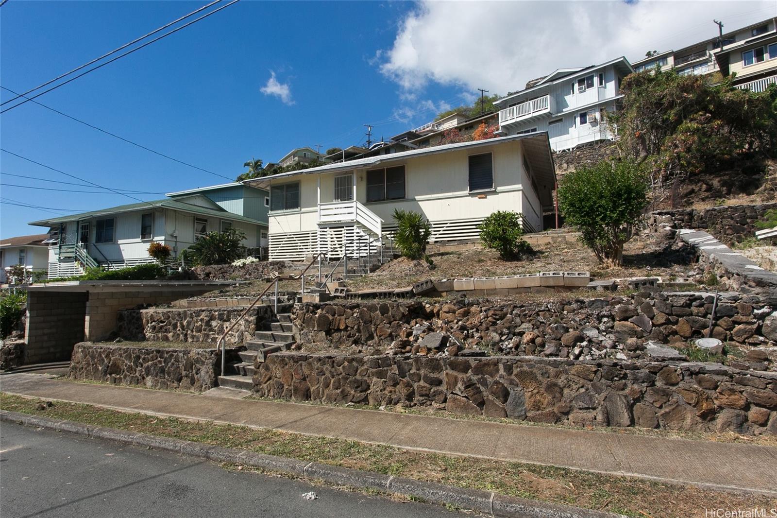 1358 Makaikoa Street Honolulu, HI 96821 - Photo 1 of 1 a front view of a house with garden