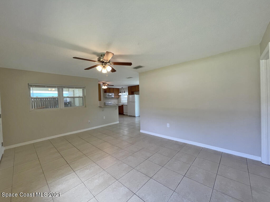 304 3rd Street Merritt Island, FL 32953 - Photo 7 of 20 Living Room 2