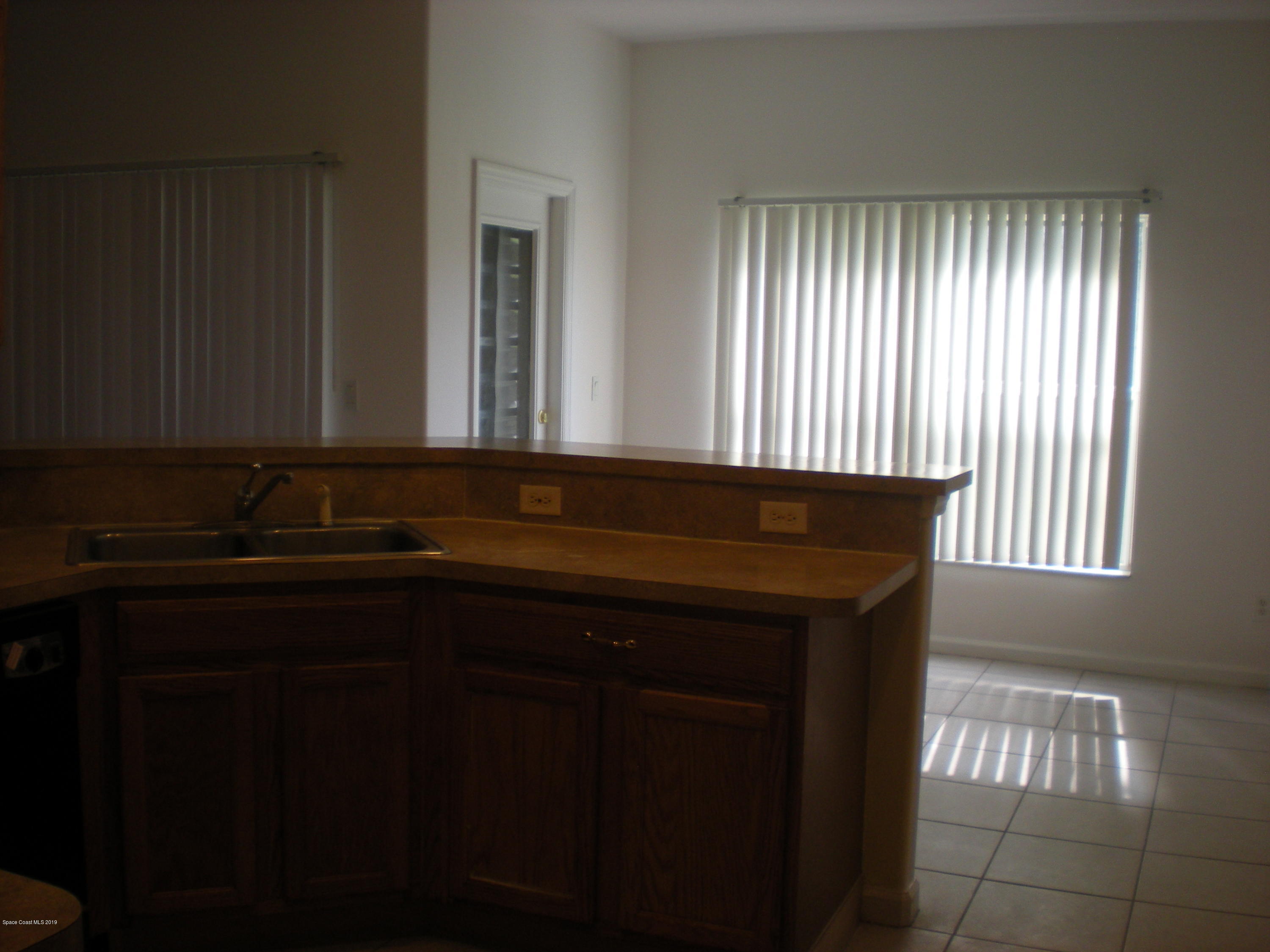 1080 Grapefruit Road Southeast Palm Bay, FL 32909 - Photo 3 of 14 595