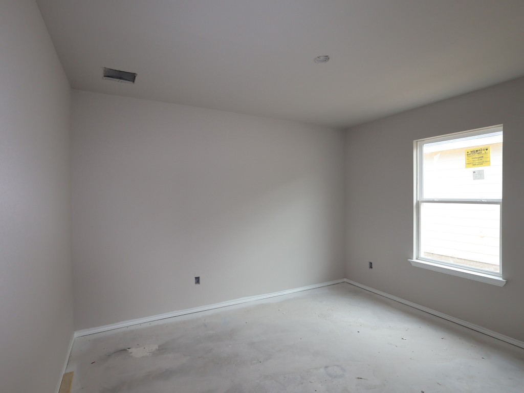 19913 Schatz Way Manor, TX 78653 - Photo 12 of 20 a view of an empty room with a window