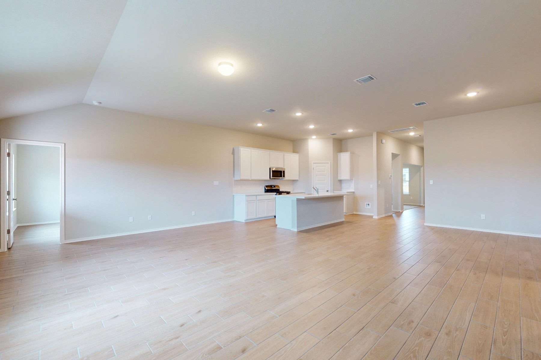 19913 Schatz Way Manor, TX 78653 - Photo 2 of 37 a view of an empty room with a kitchen