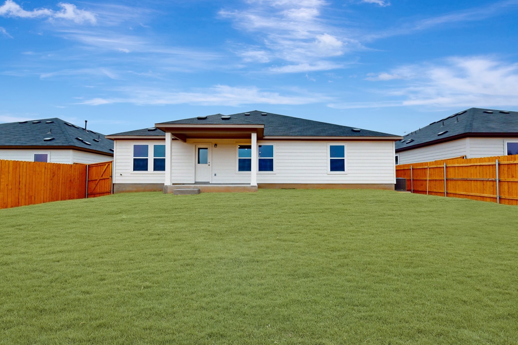 19913 Schatz Way Manor, TX 78653 - Photo 36 of 37 a front view of a house with a garden