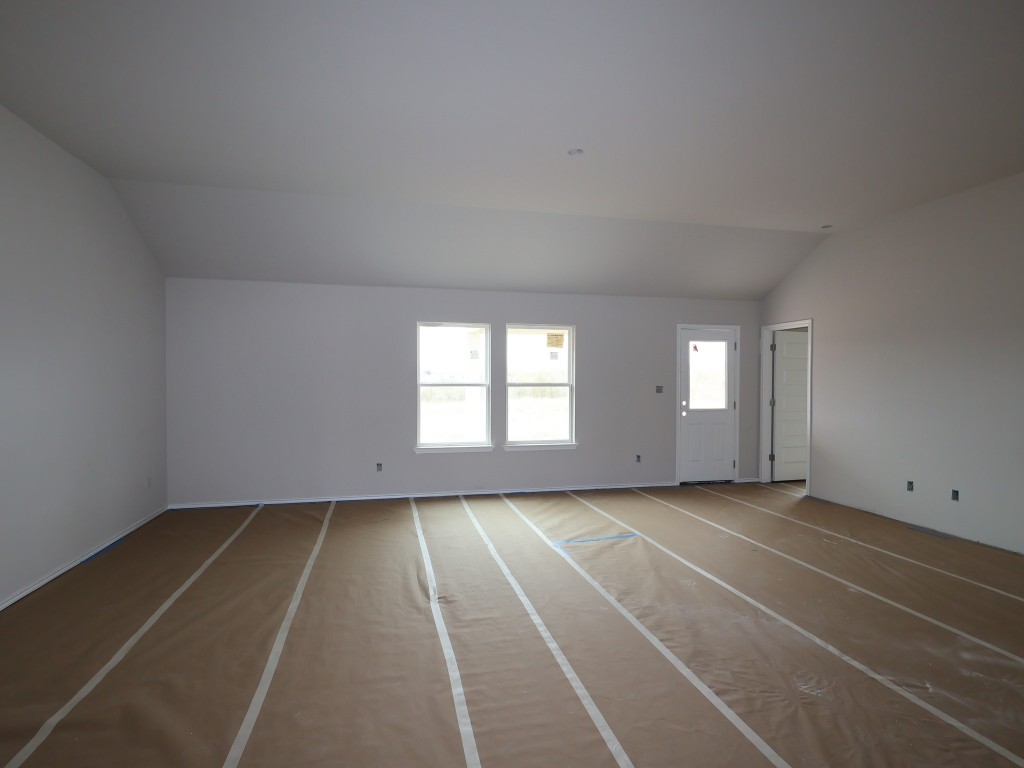 19913 Schatz Way Manor, TX 78653 - Photo 4 of 20 a view of an empty room with a window