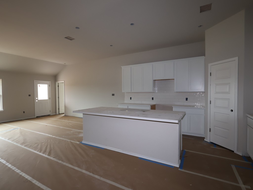 19913 Schatz Way Manor, TX 78653 - Photo 7 of 20 a room with a sink cabinets and utility room
