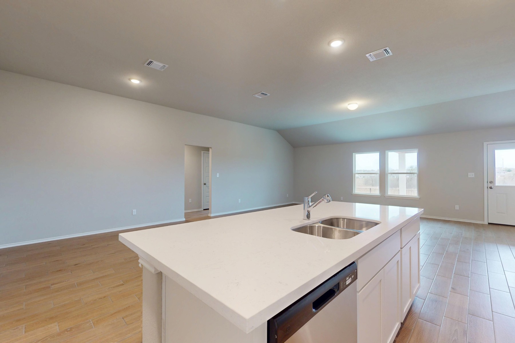 19913 Schatz Way Manor, TX 78653 - Photo 7 of 37 a kitchen with a sink and wooden floor