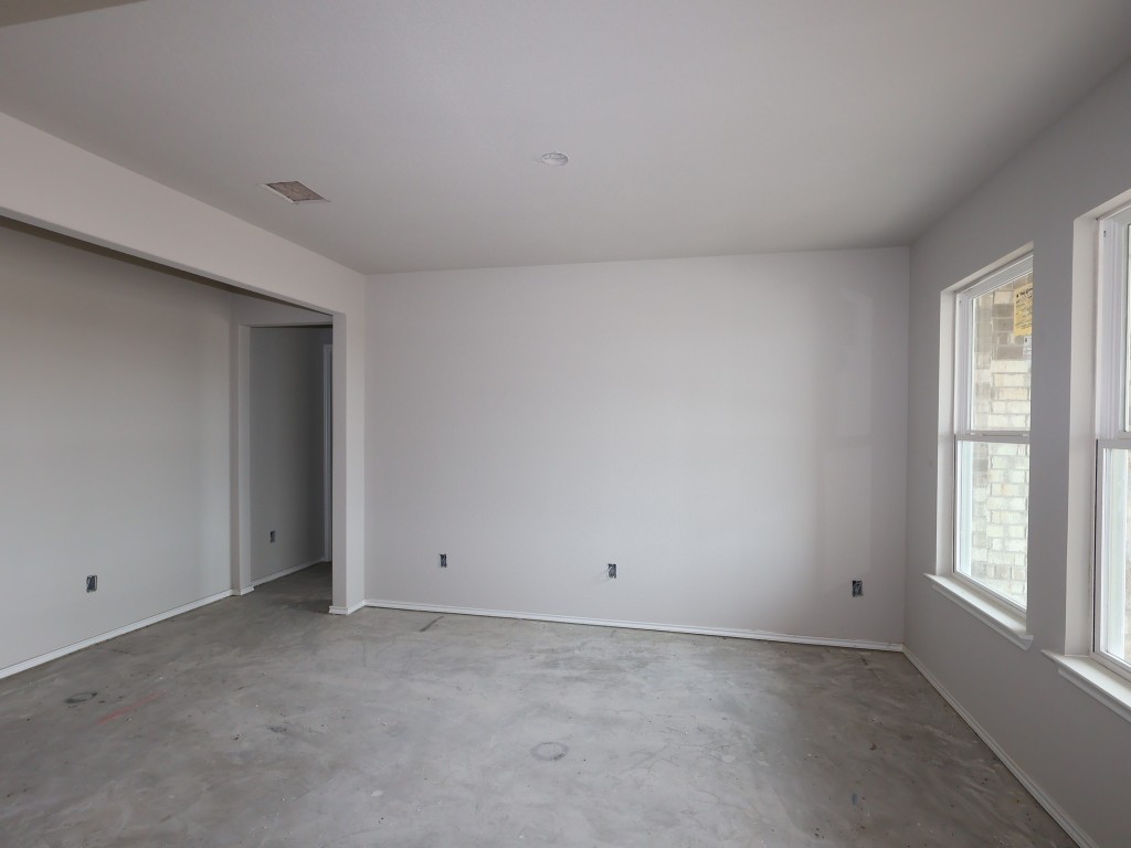19913 Schatz Way Manor, TX 78653 - Photo 10 of 20 a view of an empty room with a window