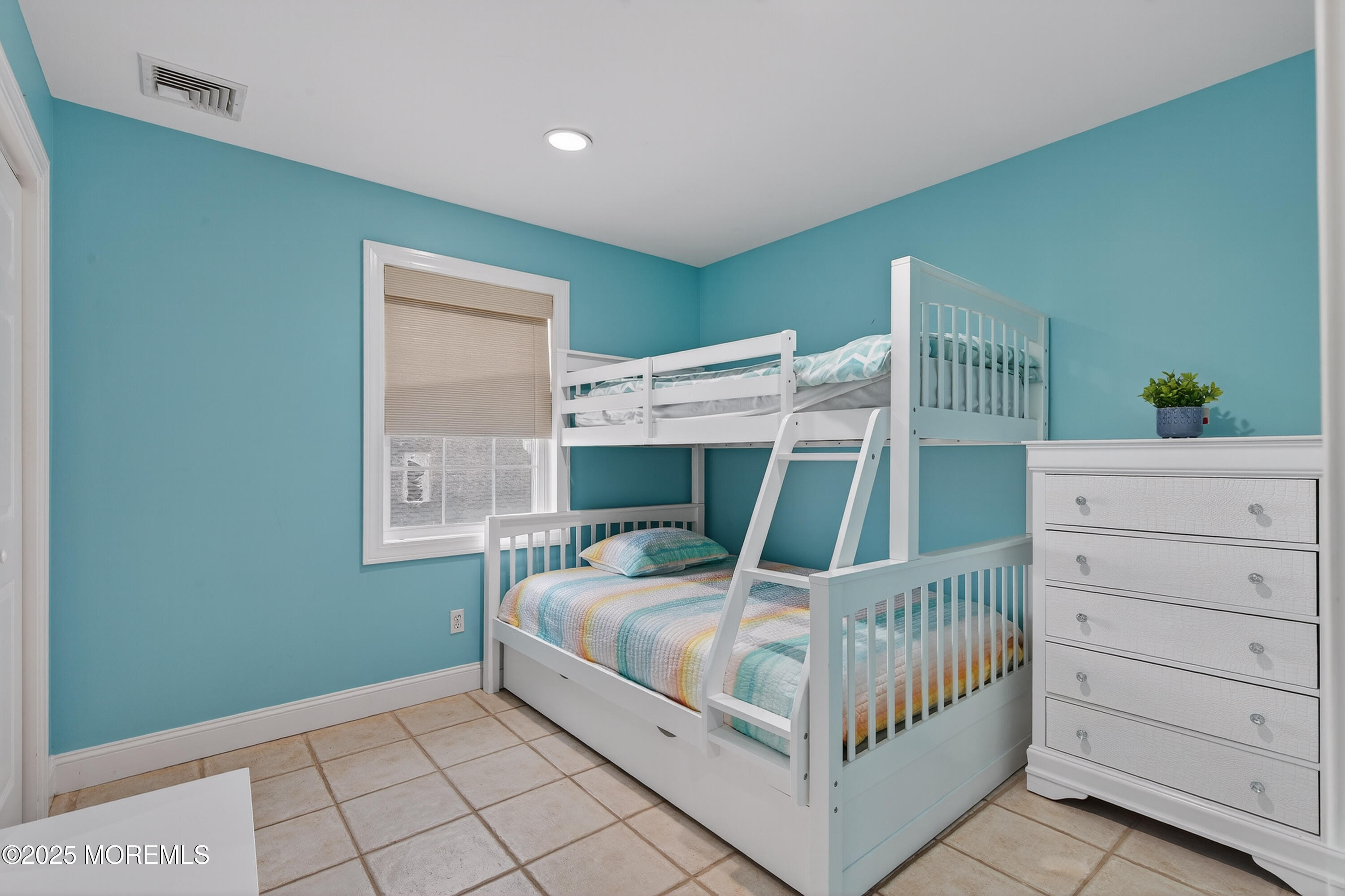 B19 Haddonfield Avenue Lavallette, NJ 08735 - Photo 27 of 34 a bedroom with a bed and a window