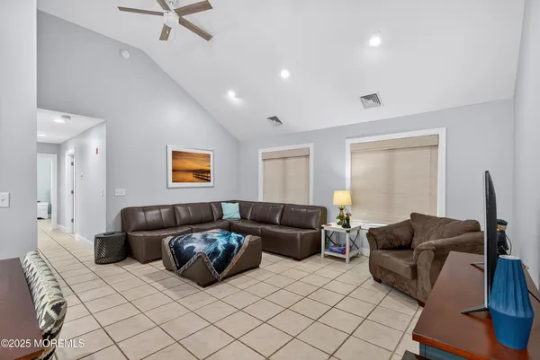 a living room with furniture and a couch
