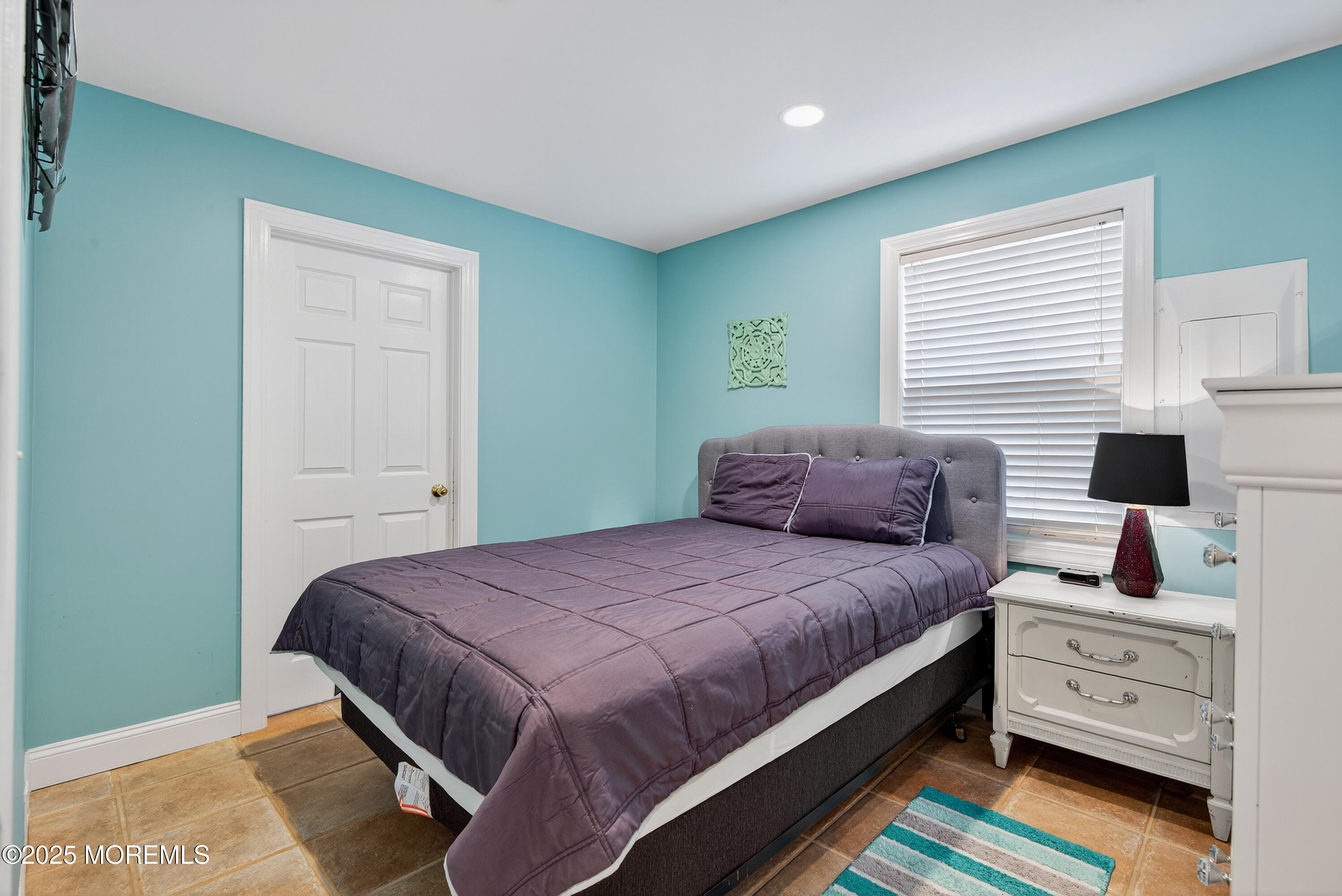 B19 Haddonfield Avenue Lavallette, NJ 08735 - Photo 10 of 34 a bedroom with a bed and a desk
