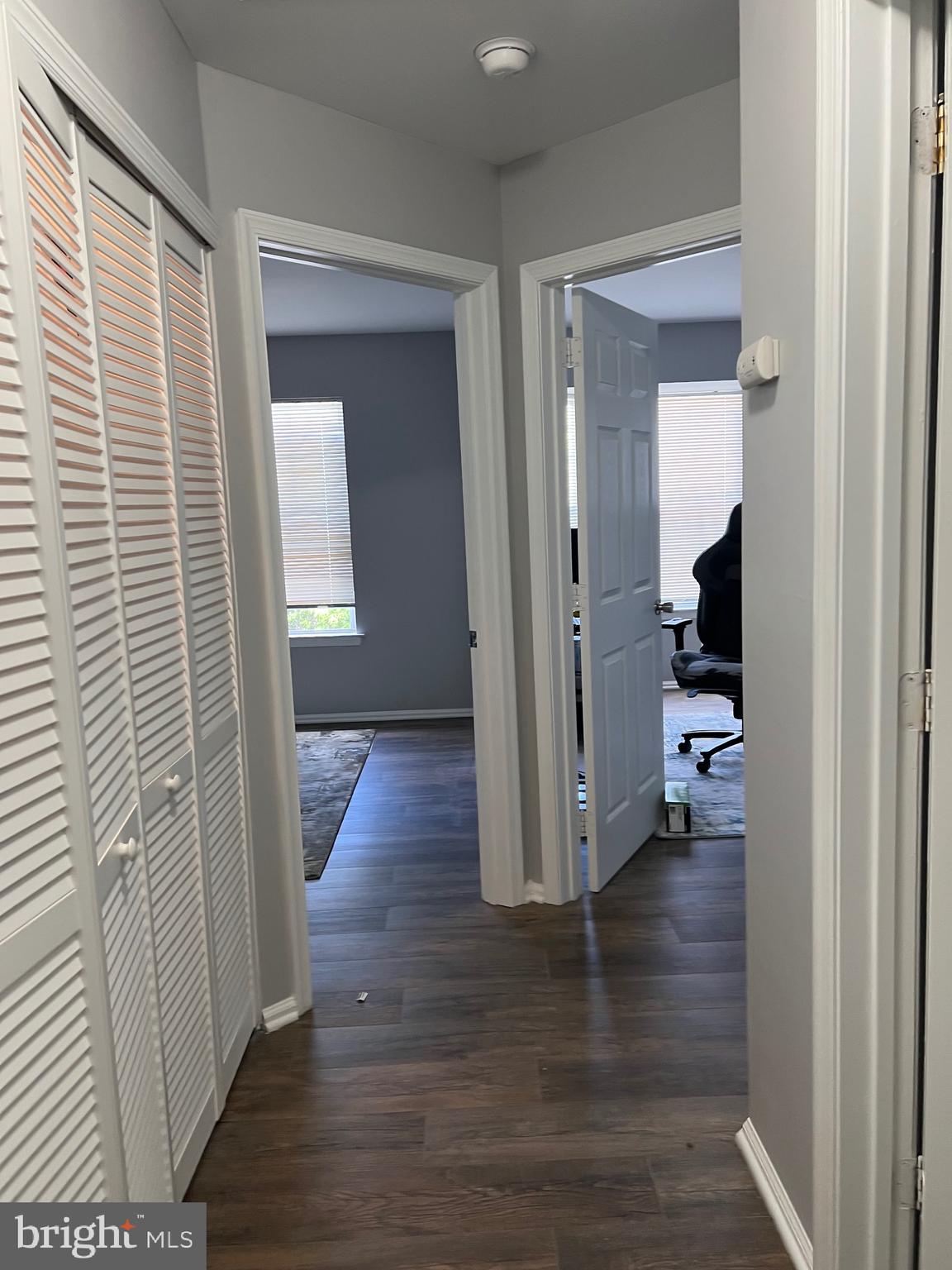 763 Barton Run Boulevard Marlton, NJ 08053 - Photo 11 of 19 a view of a hallway with wooden floor and living room