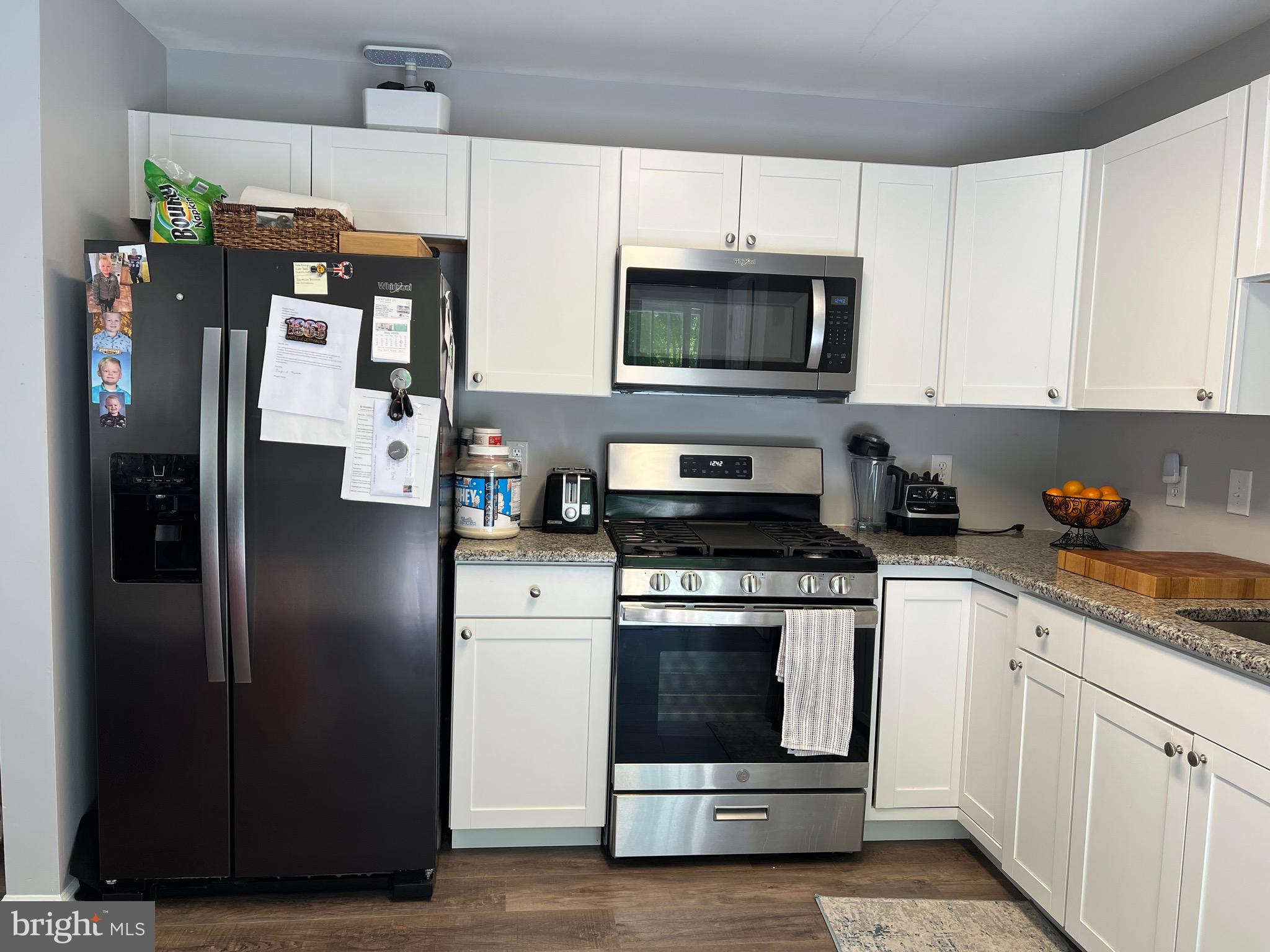 763 Barton Run Boulevard Marlton, NJ 08053 - Photo 2 of 19 a kitchen with stainless steel appliances granite countertop a refrigerator stove and sink