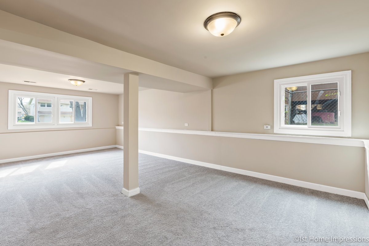 17012 Magnolia Drive Hazel Crest, IL 60429 - Photo 16 of 23 an empty room with windows and closet
