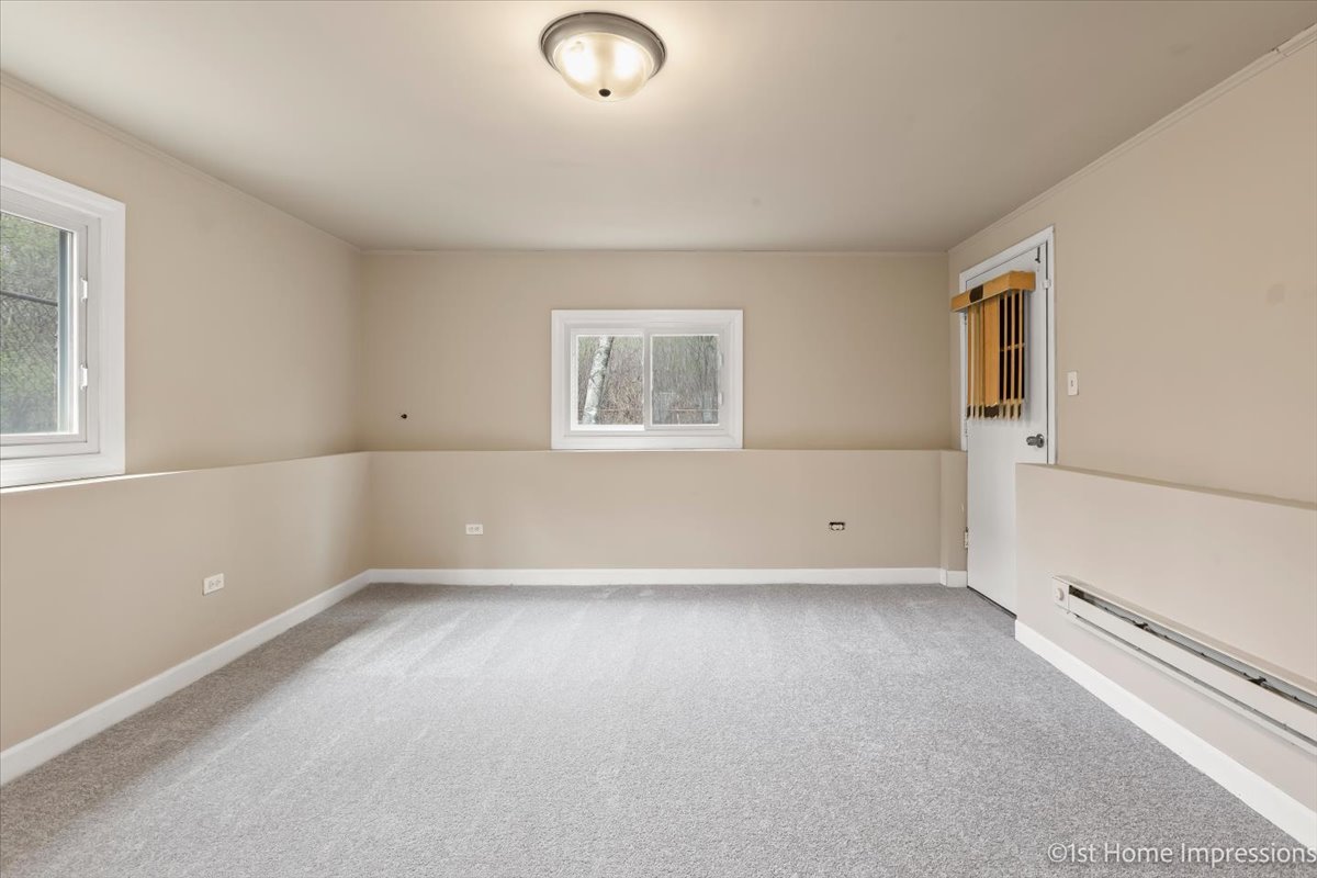 17012 Magnolia Drive Hazel Crest, IL 60429 - Photo 19 of 23 an empty room with windows