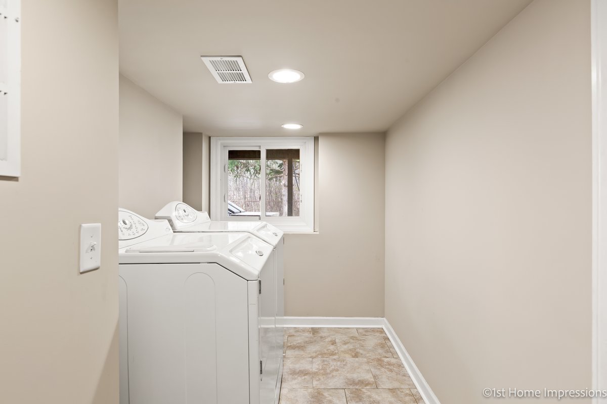 17012 Magnolia Drive Hazel Crest, IL 60429 - Photo 20 of 23 a room with a sink and washer