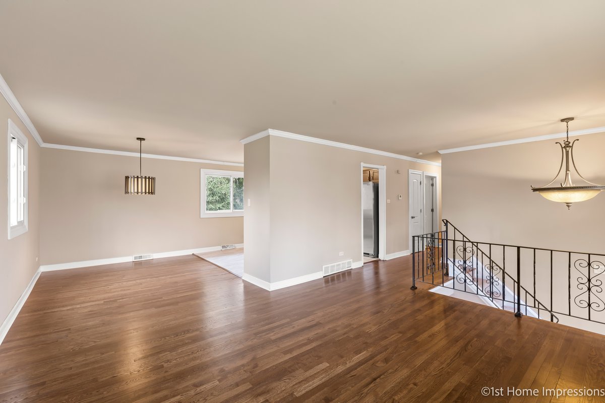 17012 Magnolia Drive Hazel Crest, IL 60429 - Photo 7 of 23 a view of empty room with wooden floor