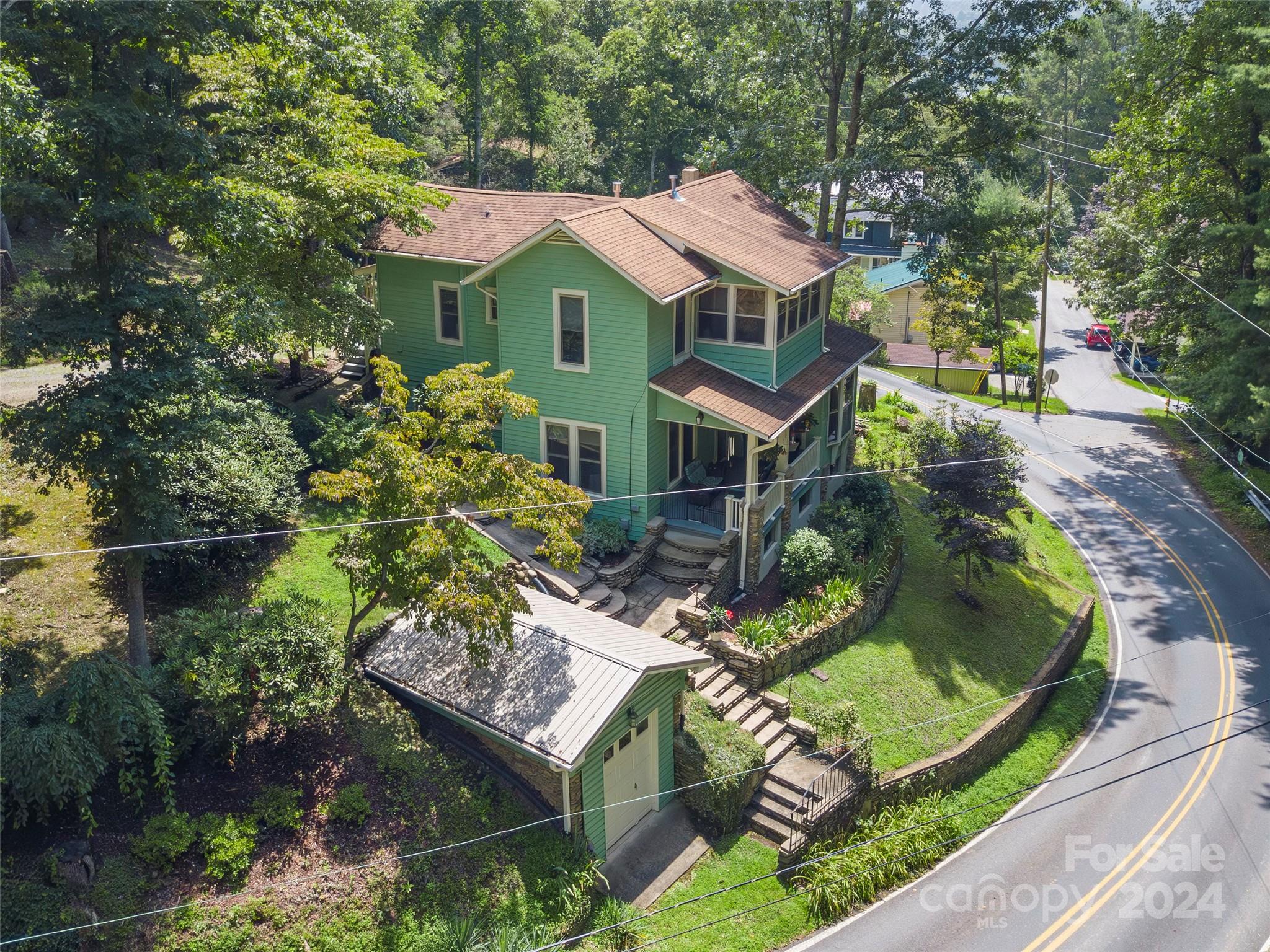 18 Kilgore Road Waynesville, NC 28785 - Photo 31 of 32 a front view of a house with garden