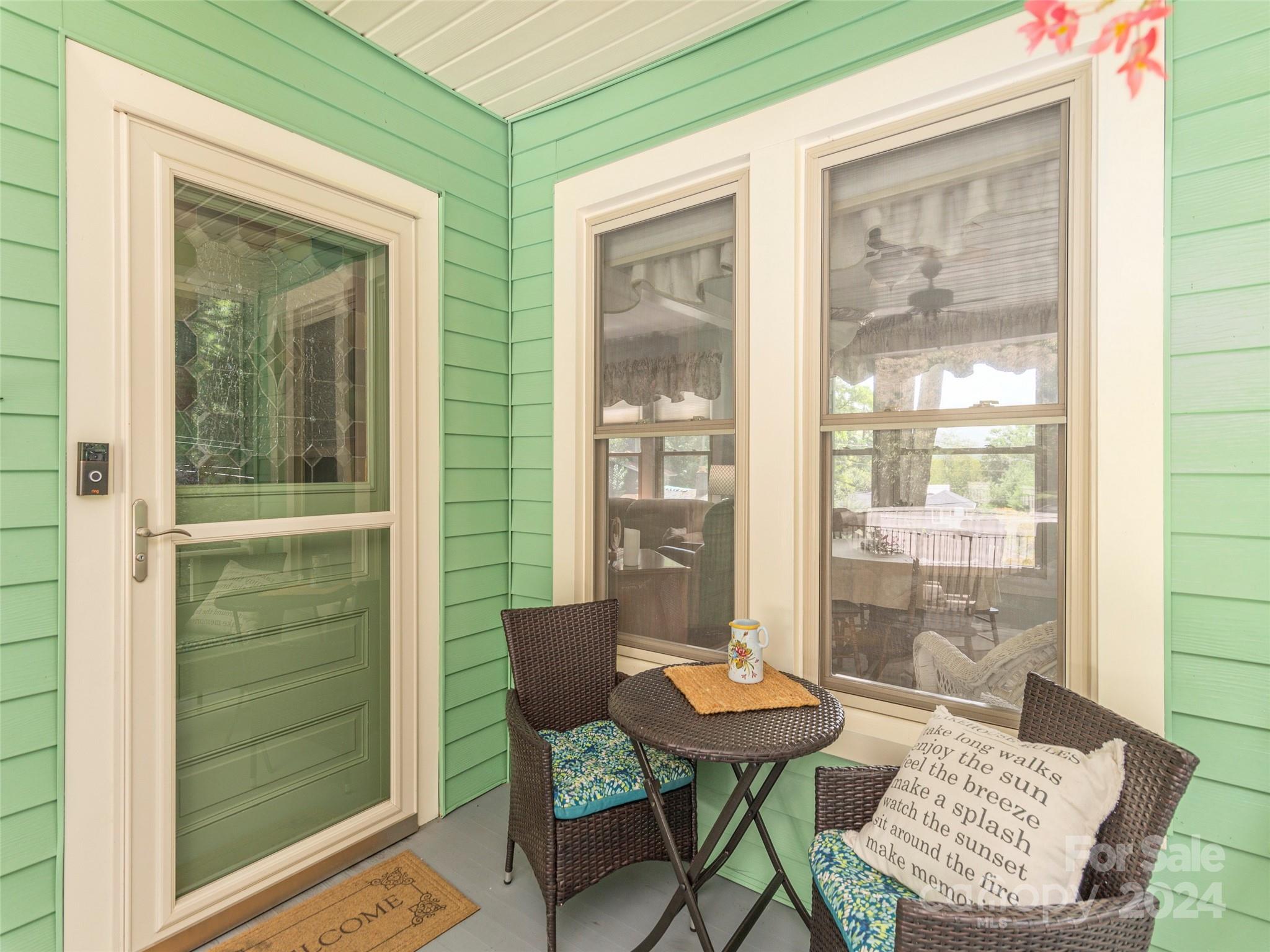 18 Kilgore Road Waynesville, NC 28785 - Photo 5 of 32 a view of a room that has a table and a chair