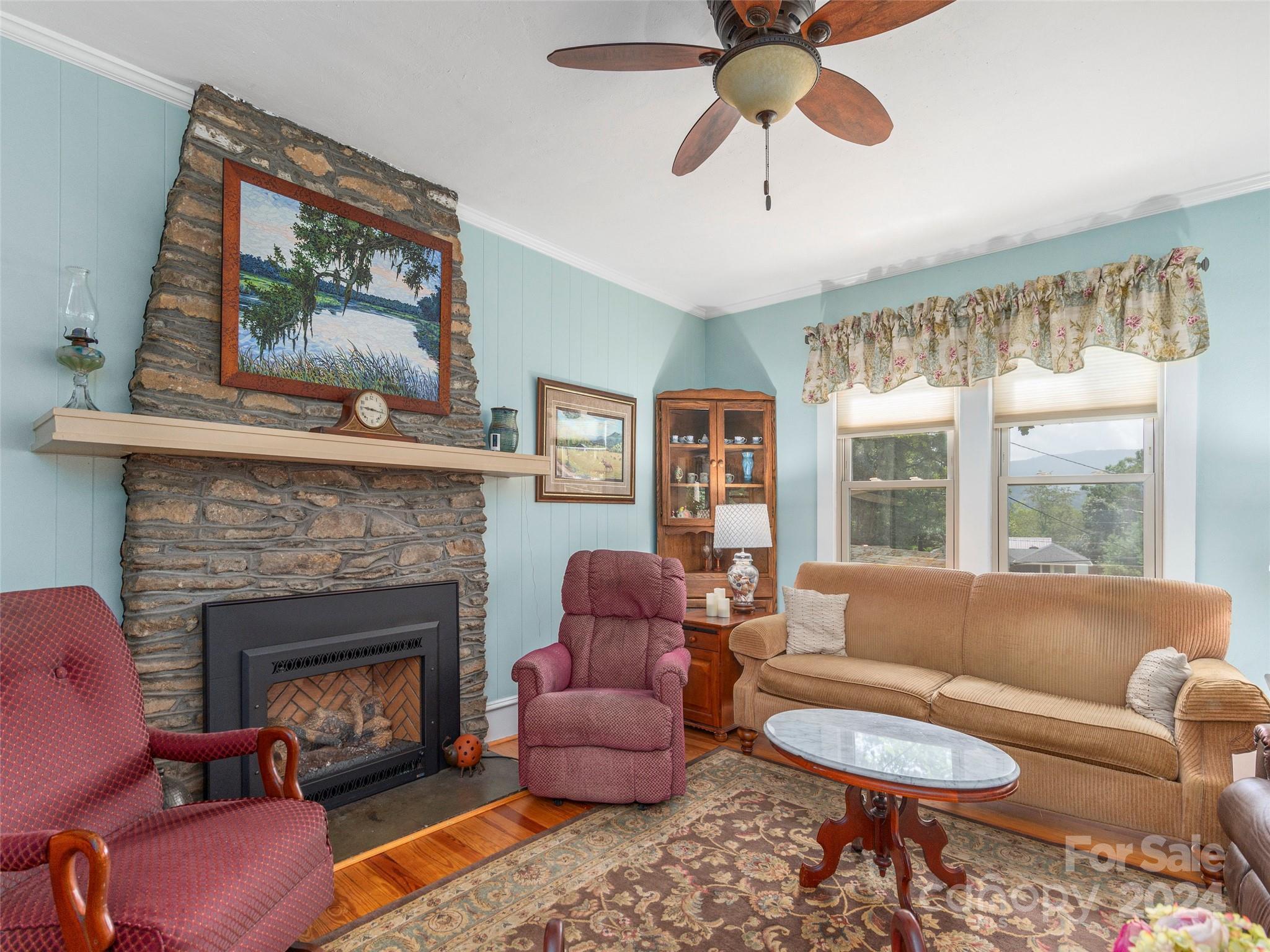 18 Kilgore Road Waynesville, NC 28785 - Photo 7 of 32 a living room with furniture and a fireplace