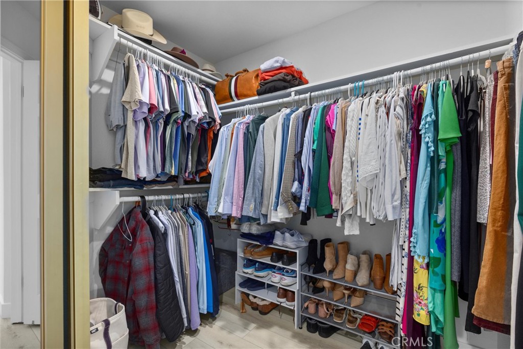 1727 Spreckels Lane Redondo Beach, CA 90278 - Photo 14 of 35 a view of walk in closet with clothes and shoes