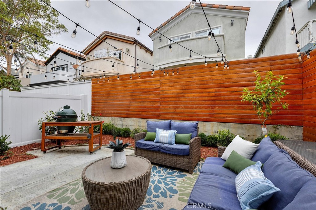 1727 Spreckels Lane Redondo Beach, CA 90278 - Photo 19 of 35 a outdoor living space with patio furniture and a ceiling fan