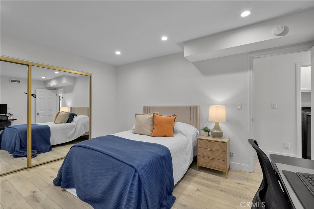 1727 Spreckels Lane Redondo Beach, CA 90278 - Photo 27 of 35 a bedroom with bed and wooden floor